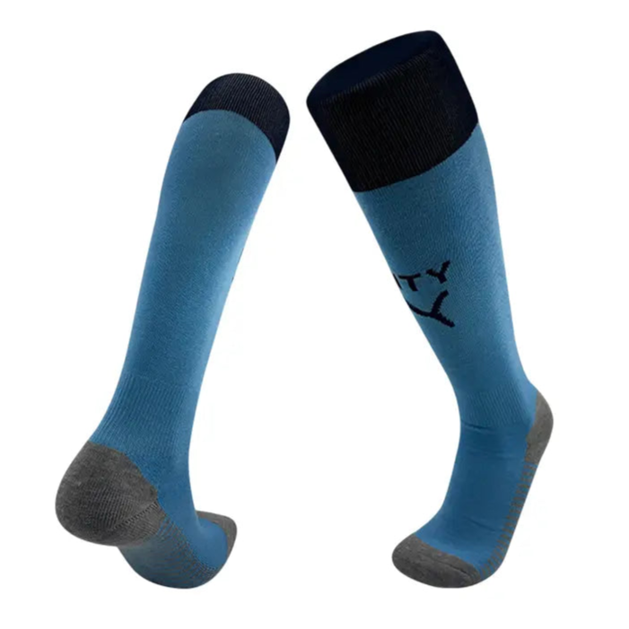 Manchester_City_Home_25-26_Meia_1.png Meia Manchester City Kids 2025/26 - Image 1